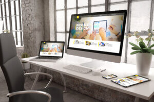 Elevate and Connect: The Importance of Website Design for Small Businesses 1 3d rendering of industrial office with devices showing ux designwebsite